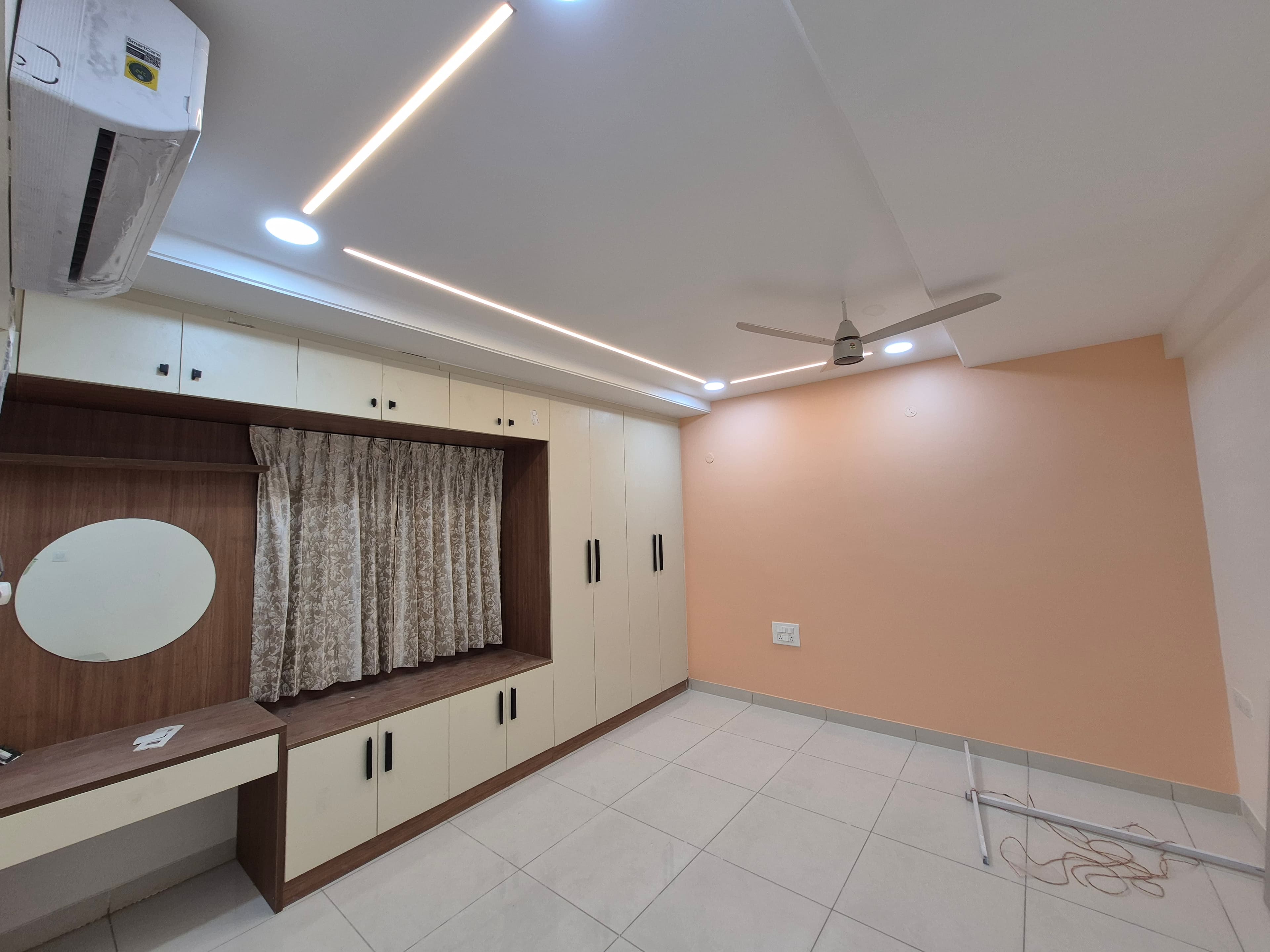 Bedroom with integrated wardrobe at Amaravati Premium Apartment