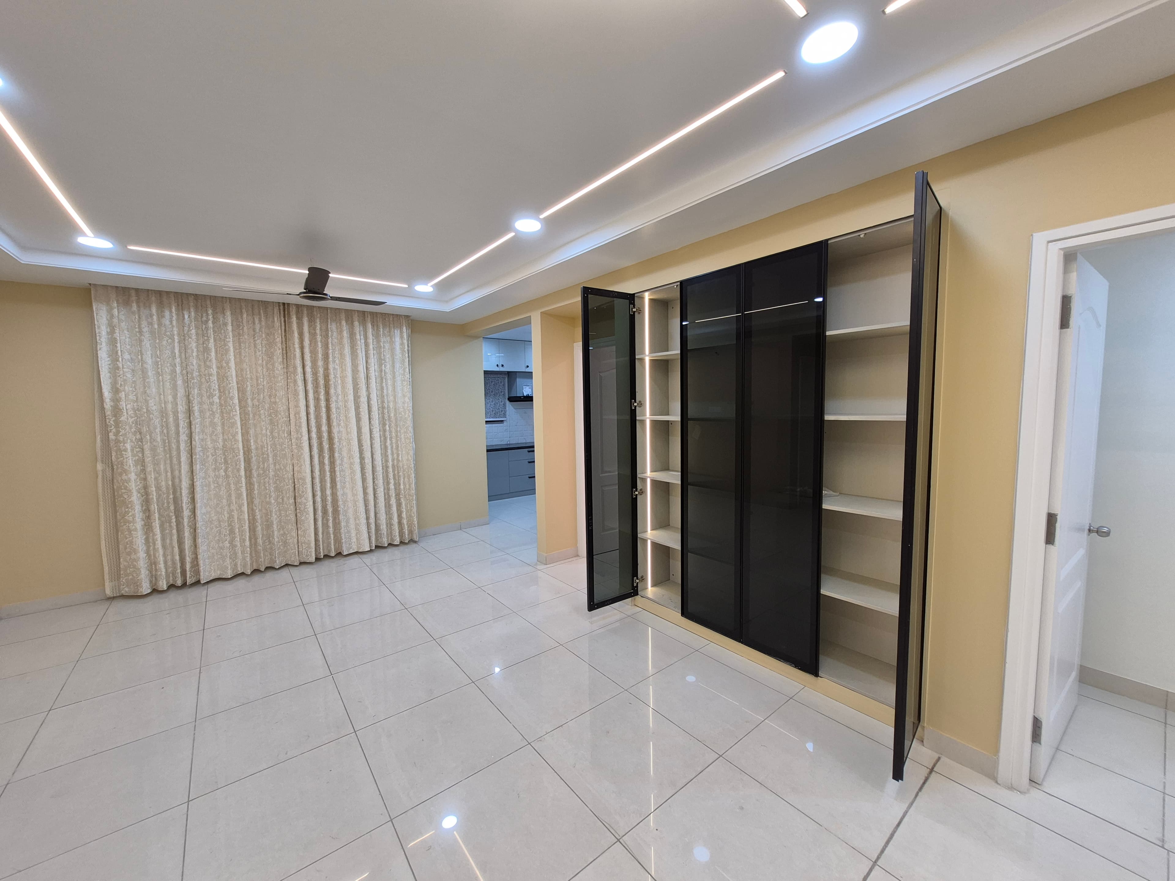 Open-plan living room with custom furniture by V3 Spaces