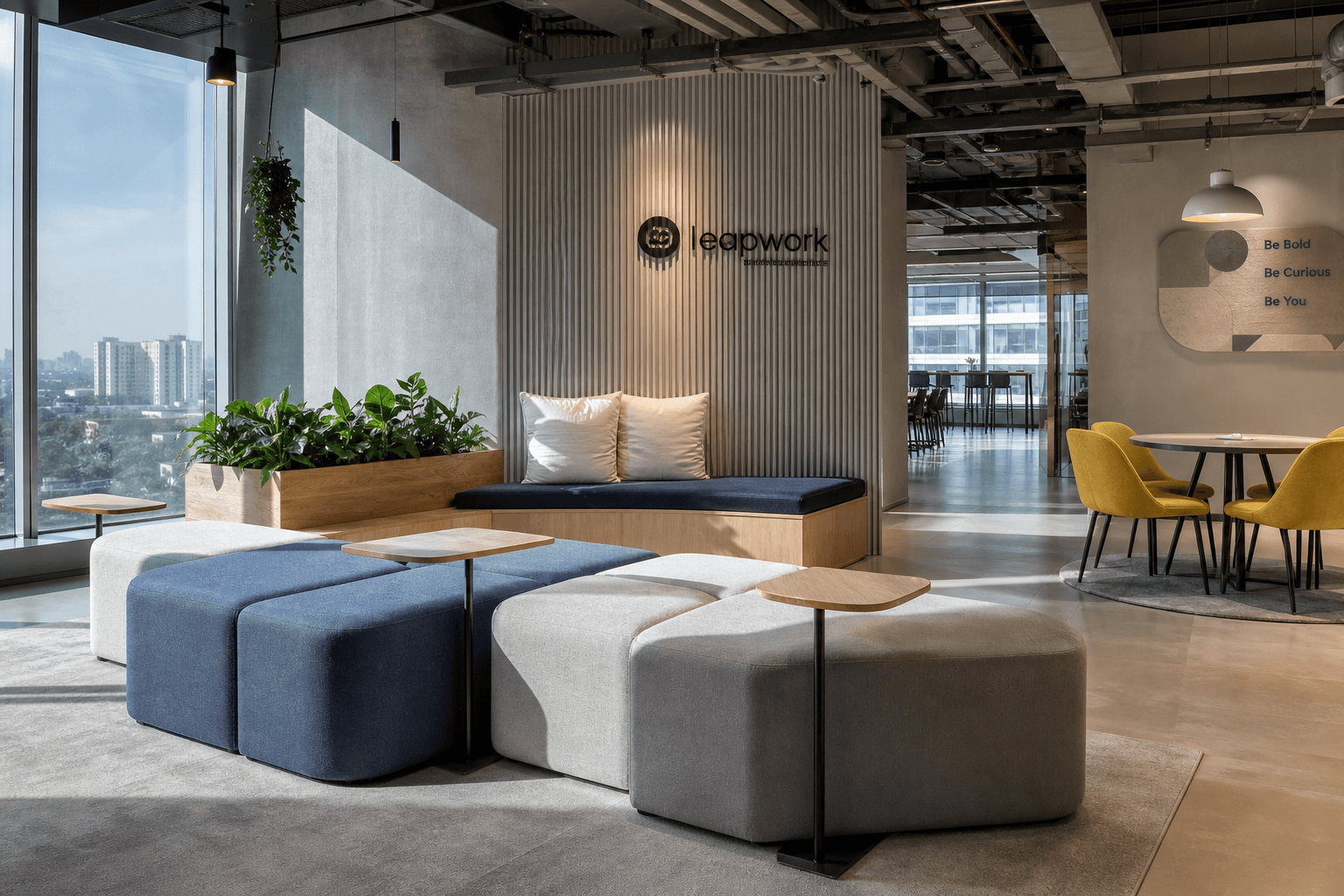 Co-working lounge with modular seating and fluted panel feature wall in Bangalore