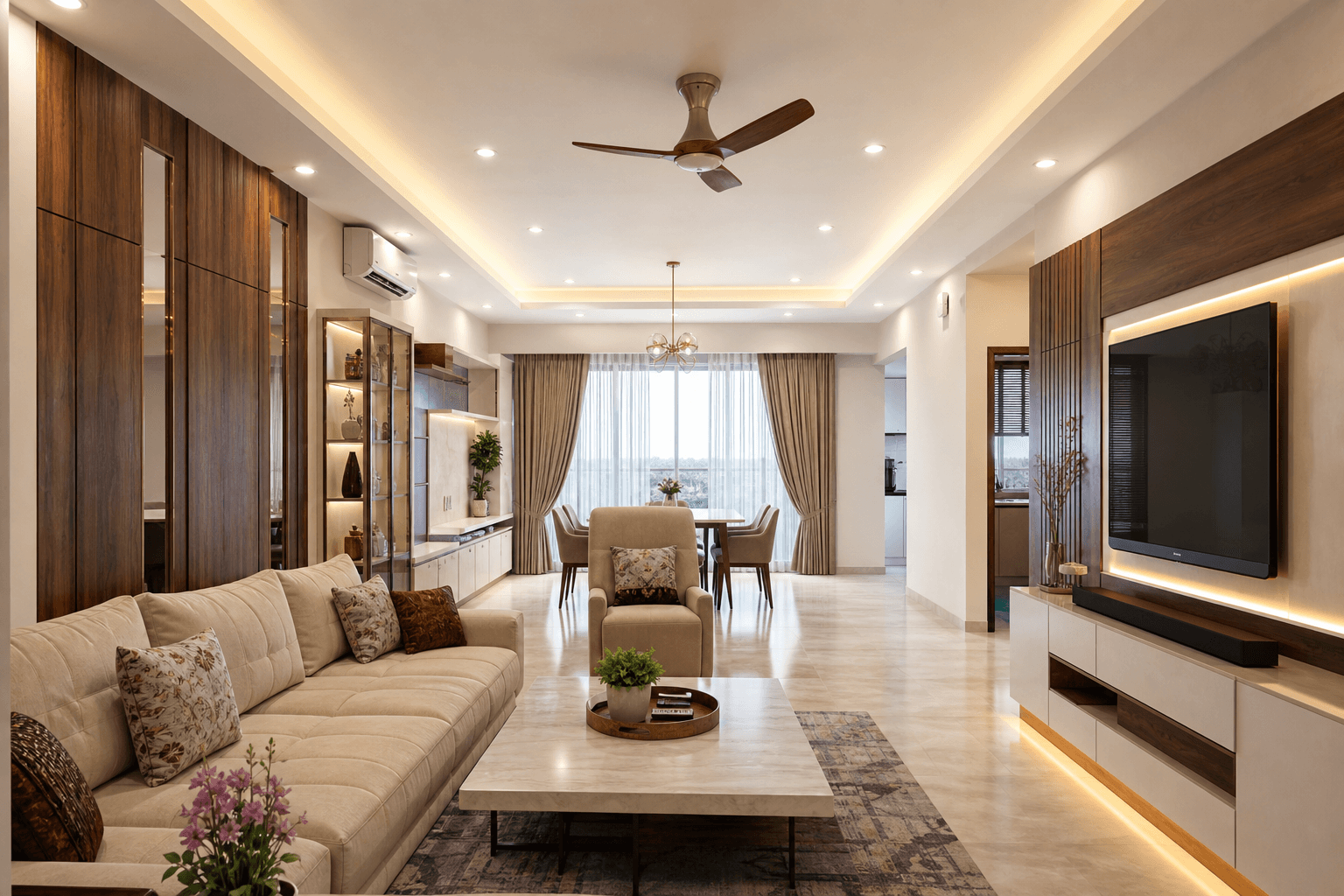 Open-plan living room with cove-lit false ceiling and wood accents in an apartment