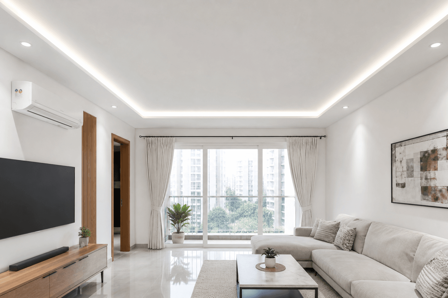 Minimal white false ceiling with linear LED profile in a Bangalore apartment