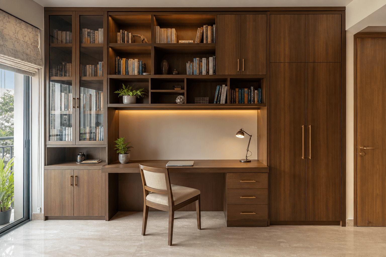 Bespoke floor-to-ceiling study unit with integrated desk, shelving and storage in an Indian apartment