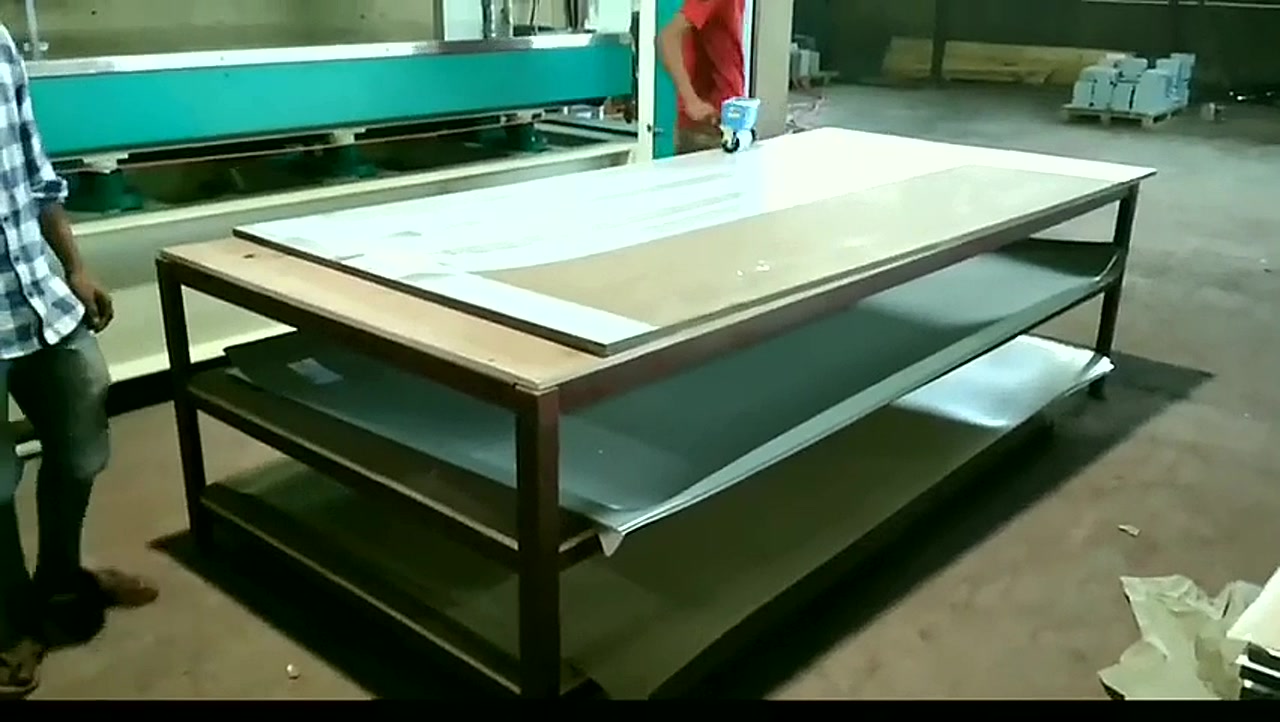 Hot press lamination at the V3 Spaces manufacturing facility